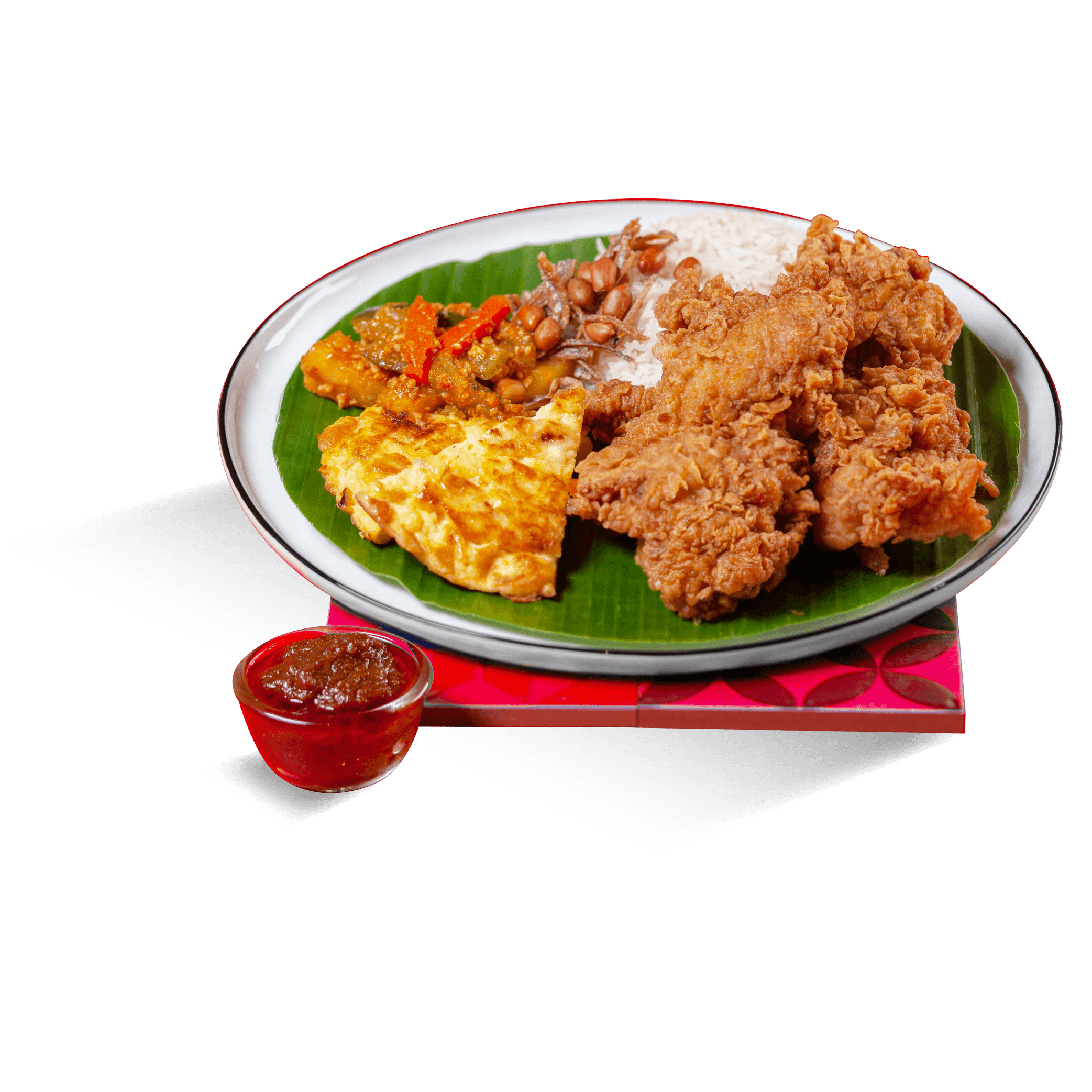 Nasi Lemak with fried chicken, egg, cucumber and sambal.