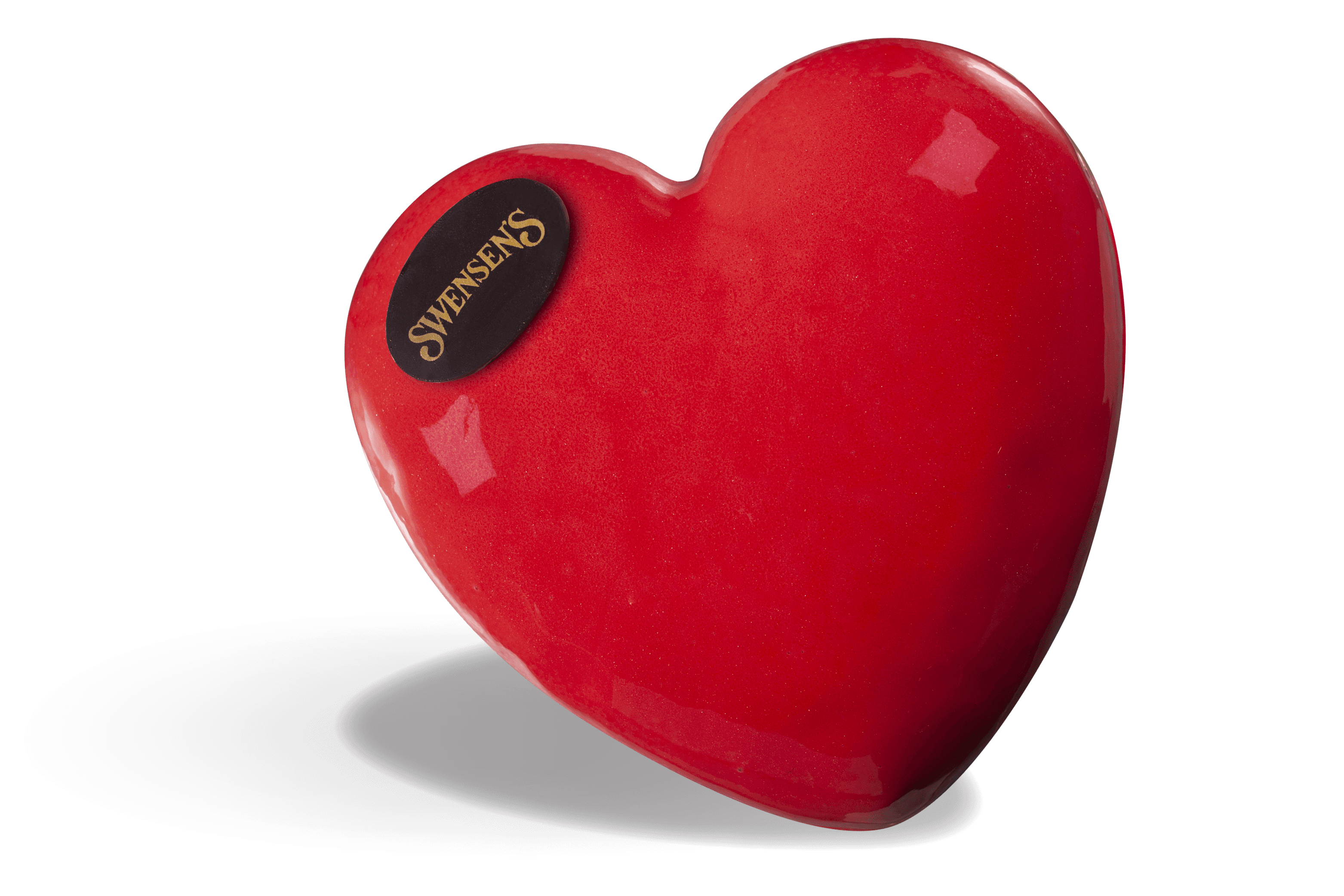 Sticky Chewy Heart ice cream cake with a glossy red heart-shaped coating.