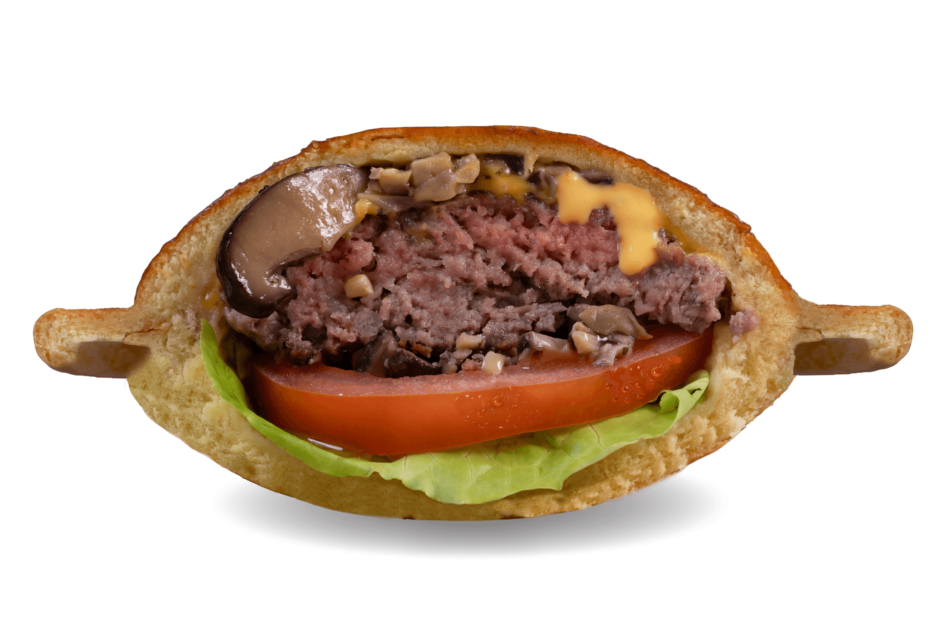 Truffle Shroom UFO Burger, cut open to show the beef patty, mushrooms, tomato and lettuce.