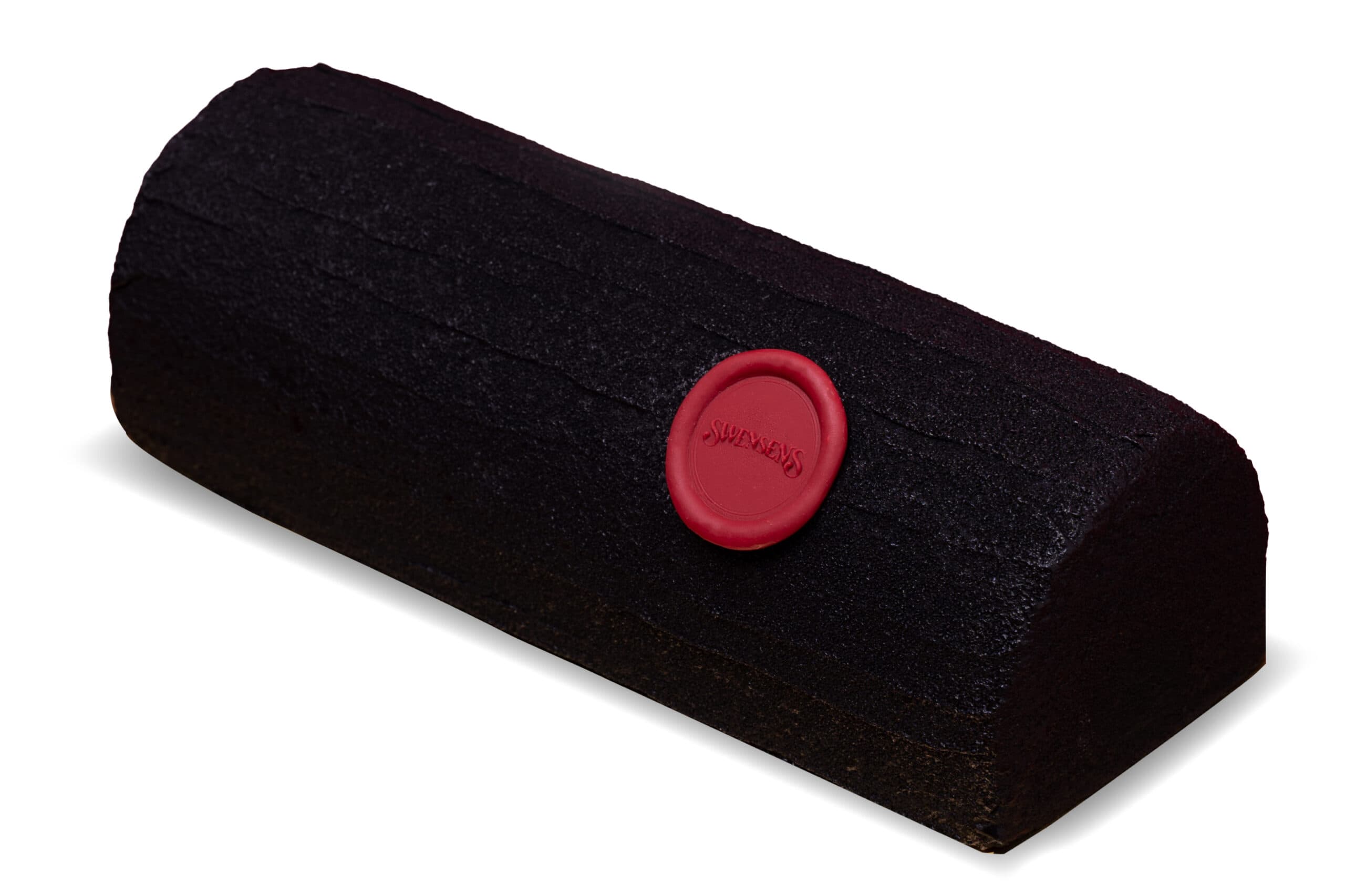 Sticky Chewy Chocolate Zer0 log cake with a dark cocoa coating and red Swensen’s emblem