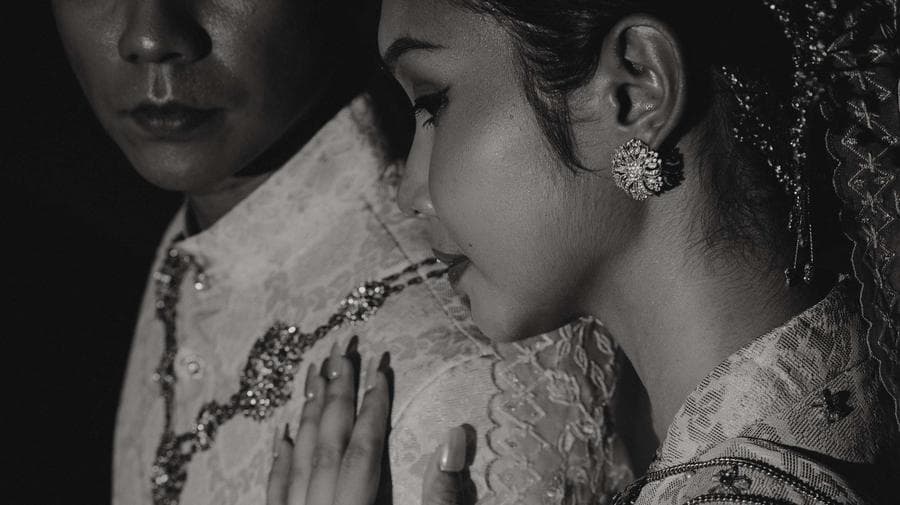 A quiet moment between a couple during their celebration at The Acacia